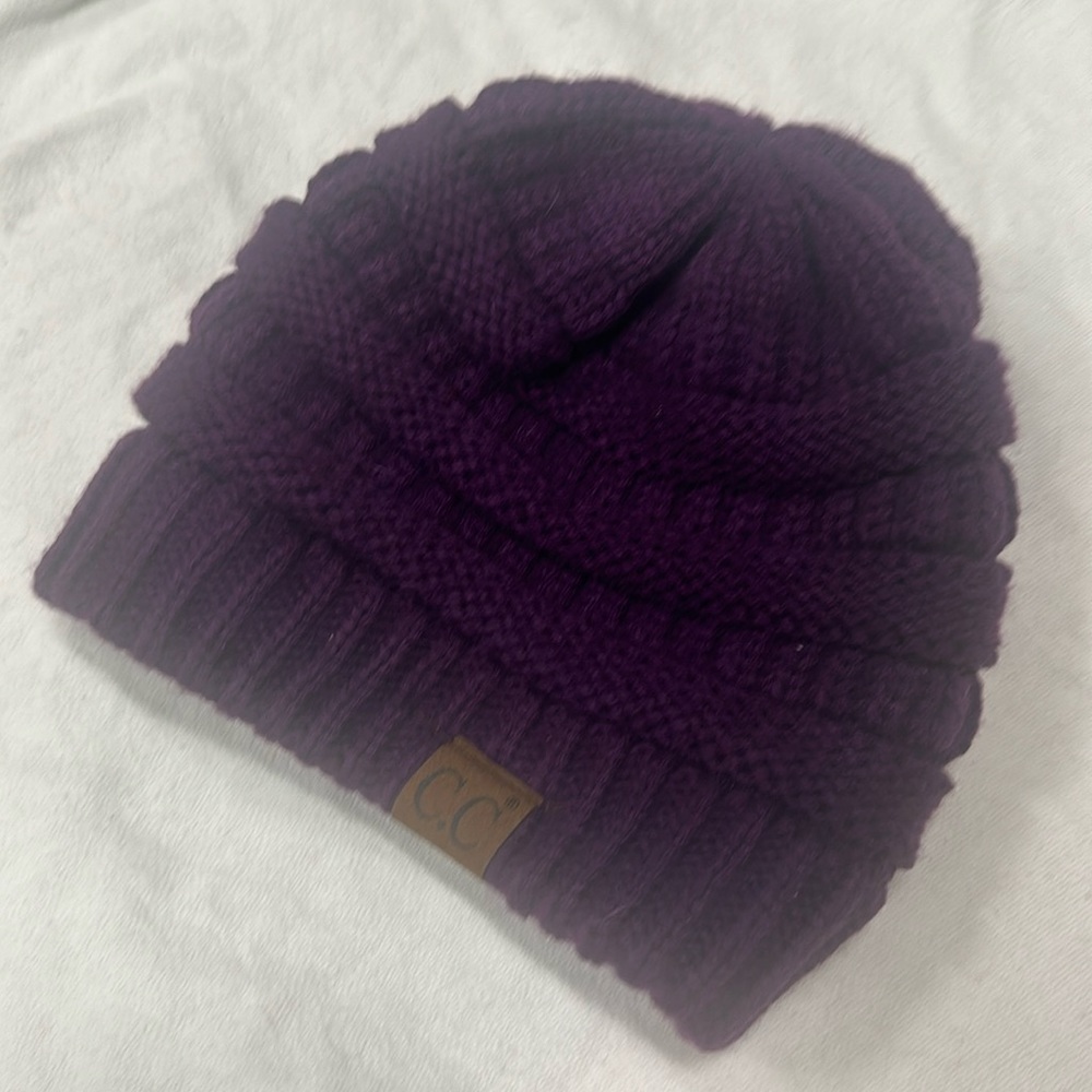 Women’s CC purple knit beanie. Like new